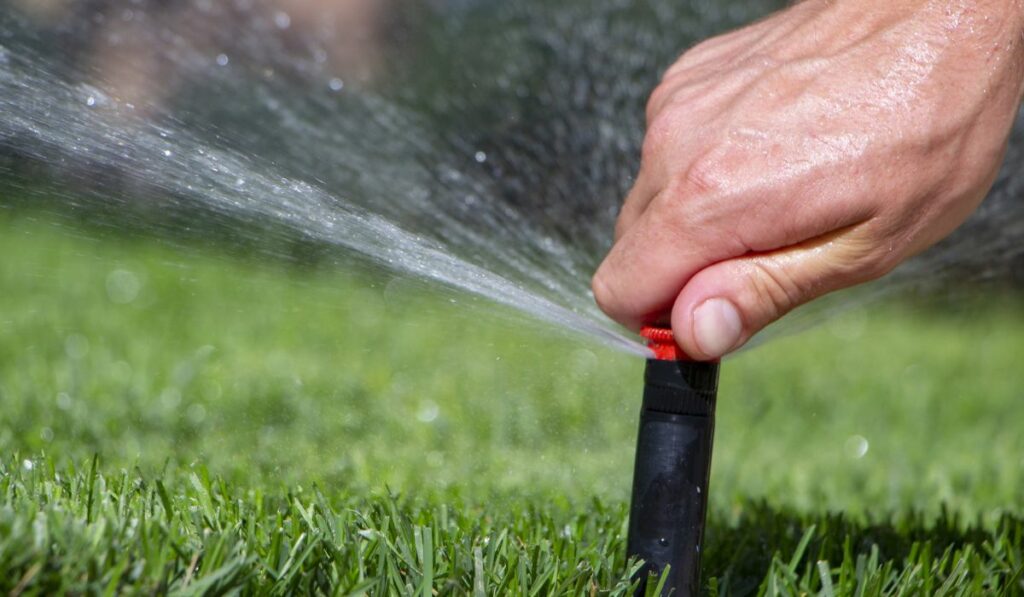 Automatic sprinkler system watering the lawn